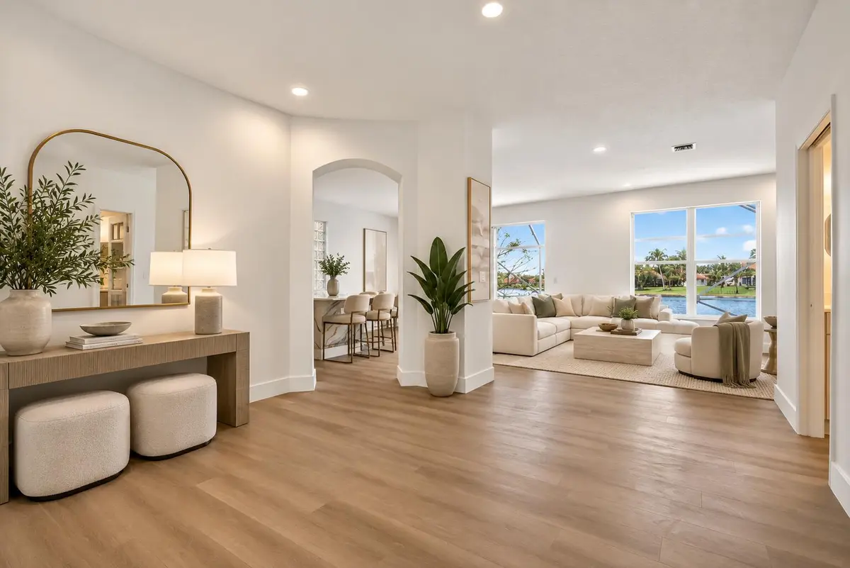 Modern Coastal Living with Lake Views at 7823 SPRINGFIELD LAKE Drive, Lake Worth