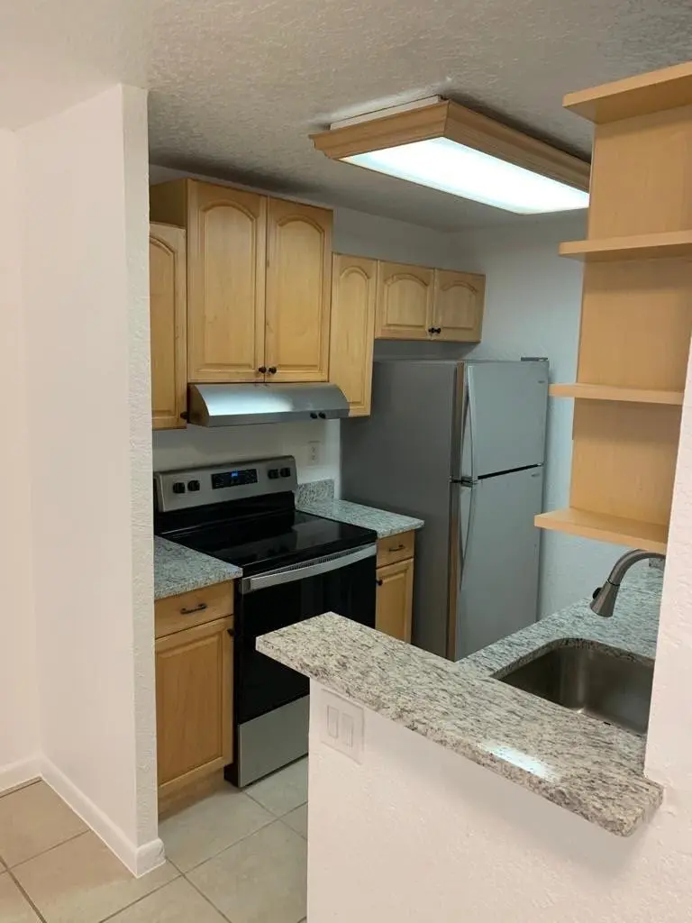 Photo 3 at 9916 TWIN LAKES Drive 33-C, Coral Springs