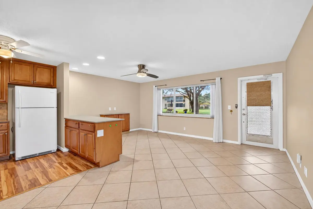 Living Room & Dining Area at 221 COVENTRY J, West Palm Beach