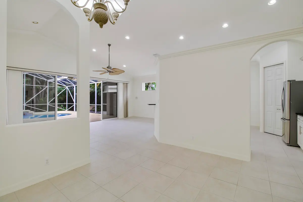 Dining to Living at 6815 SE Twin Oaks Circle, Stuart