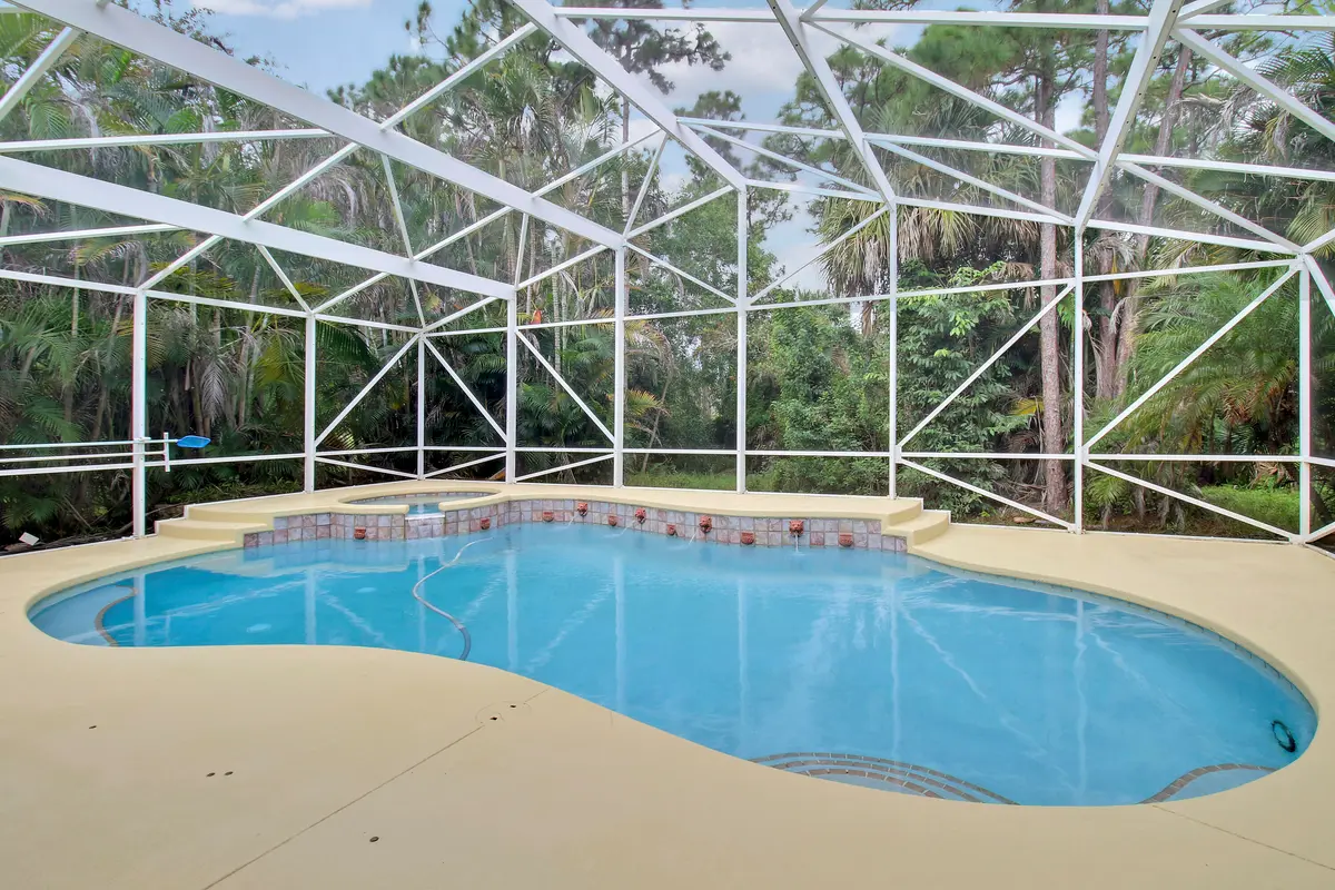 Screened-in & Heated Pool & Spa at 6815 SE Twin Oaks Circle, Stuart