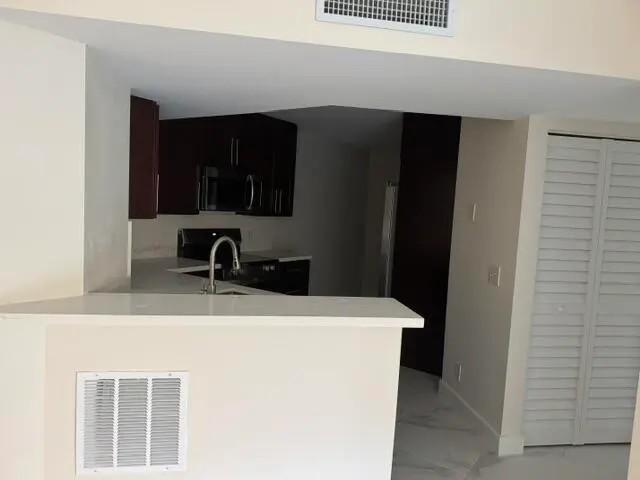 5D6E7F1D-6B6C-4673-A1AF-9E19AB1885E6 at 8801 WILES Road 107, Coral Springs