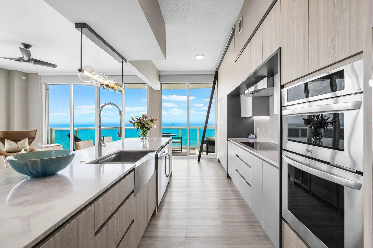 020 - Kitchen_extensive cabinetry at 4240 Galt Ocean Drive 2402, Fort Lauderdale