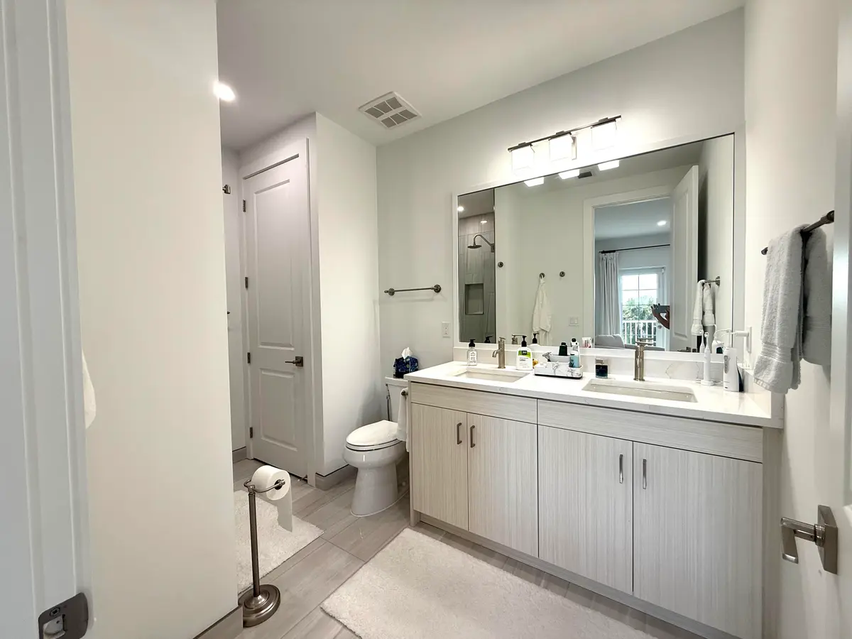 Primary bathroom w/walkin shower at 140 Water Pointe Place 12, Jupiter
