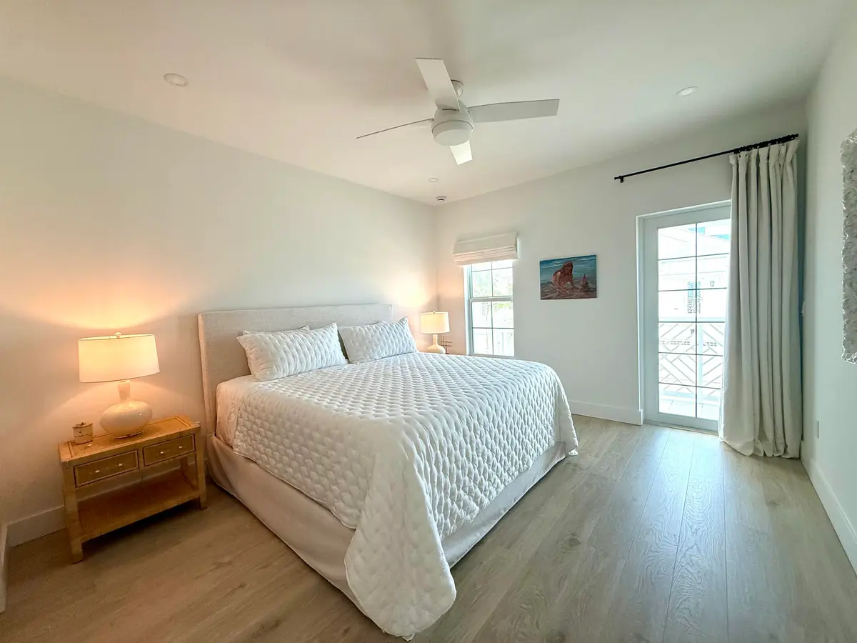 Guest bedroom w/King Bed at 140 Water Pointe Place 12, Jupiter