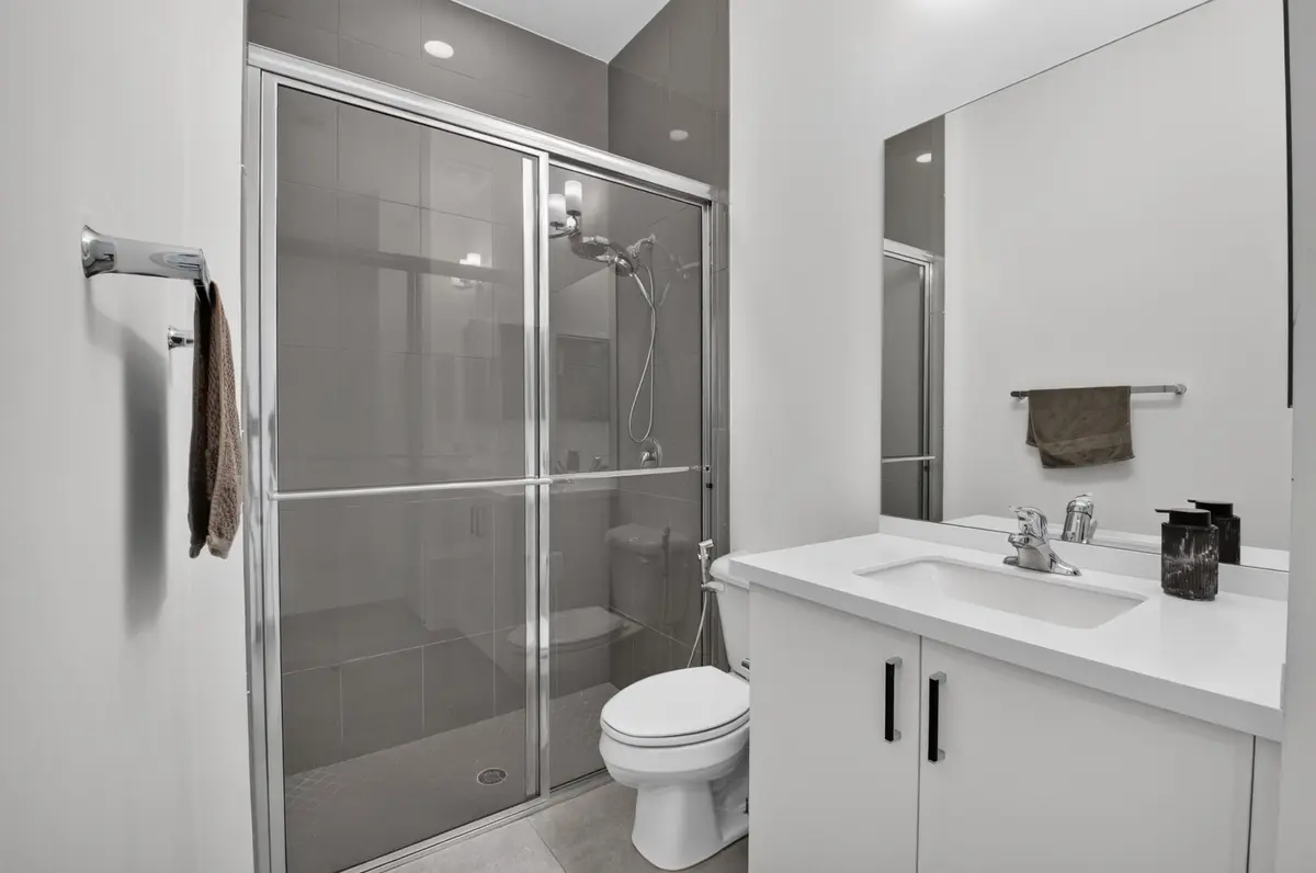 Main Level Ensuite Bath at 8074 LAUREL FALLS Drive, Boca Raton