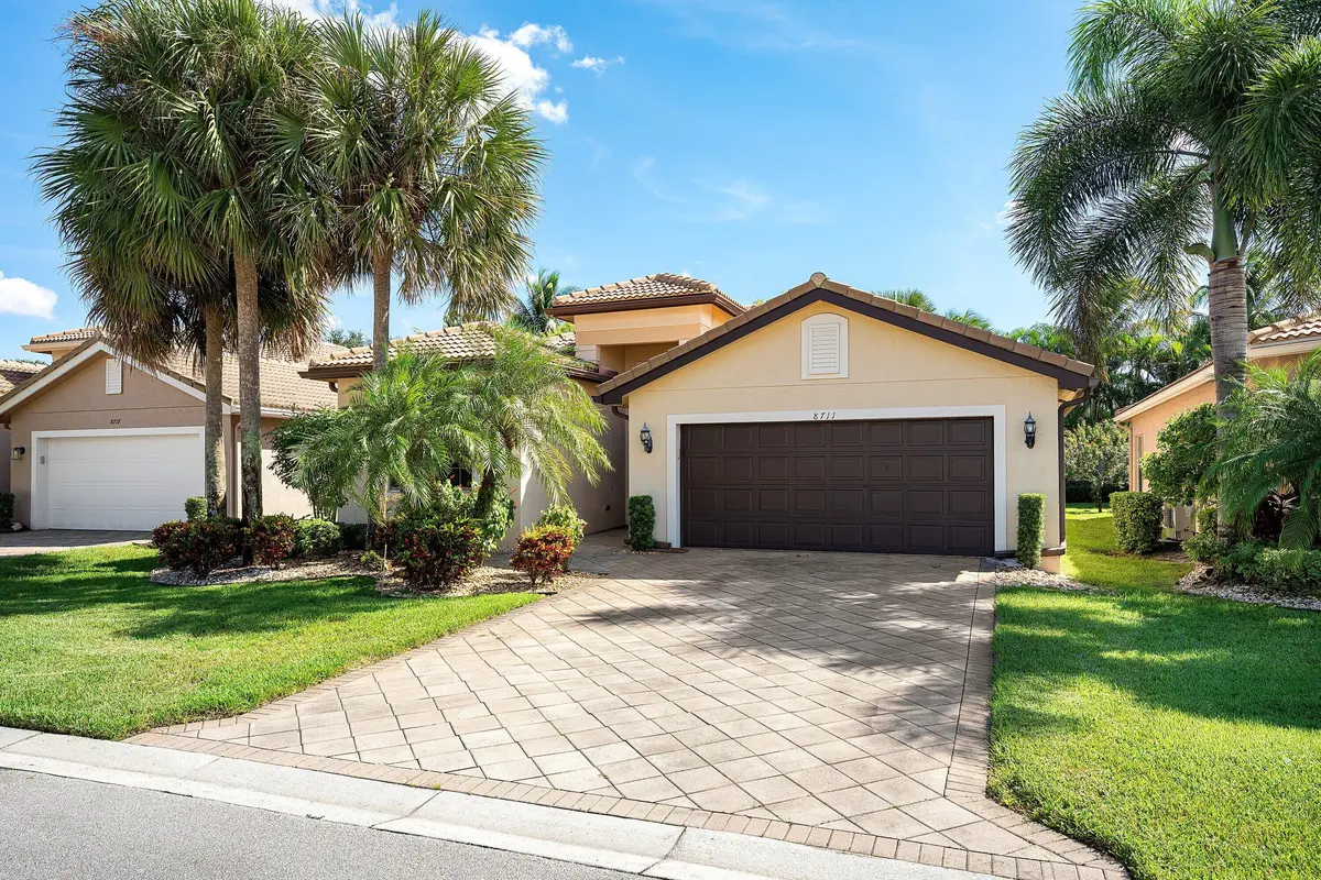 Lushly Landscaped Exterior at 8711 Sunbeam Mountain Terrace, Boynton Beach