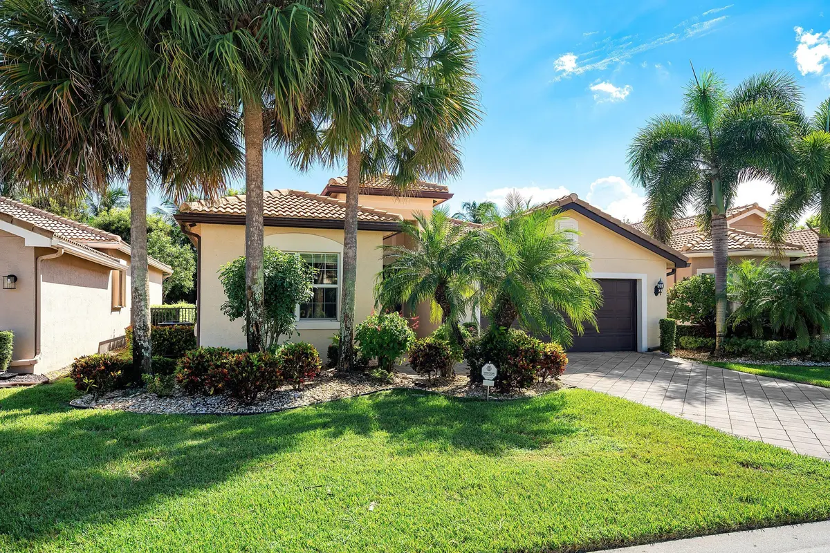 Lushly Landscaped Exterior at 8711 Sunbeam Mountain Terrace, Boynton Beach