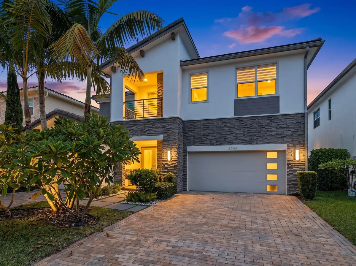 Front Exterior Twilight at 5244 Beland Drive, Lake Worth
