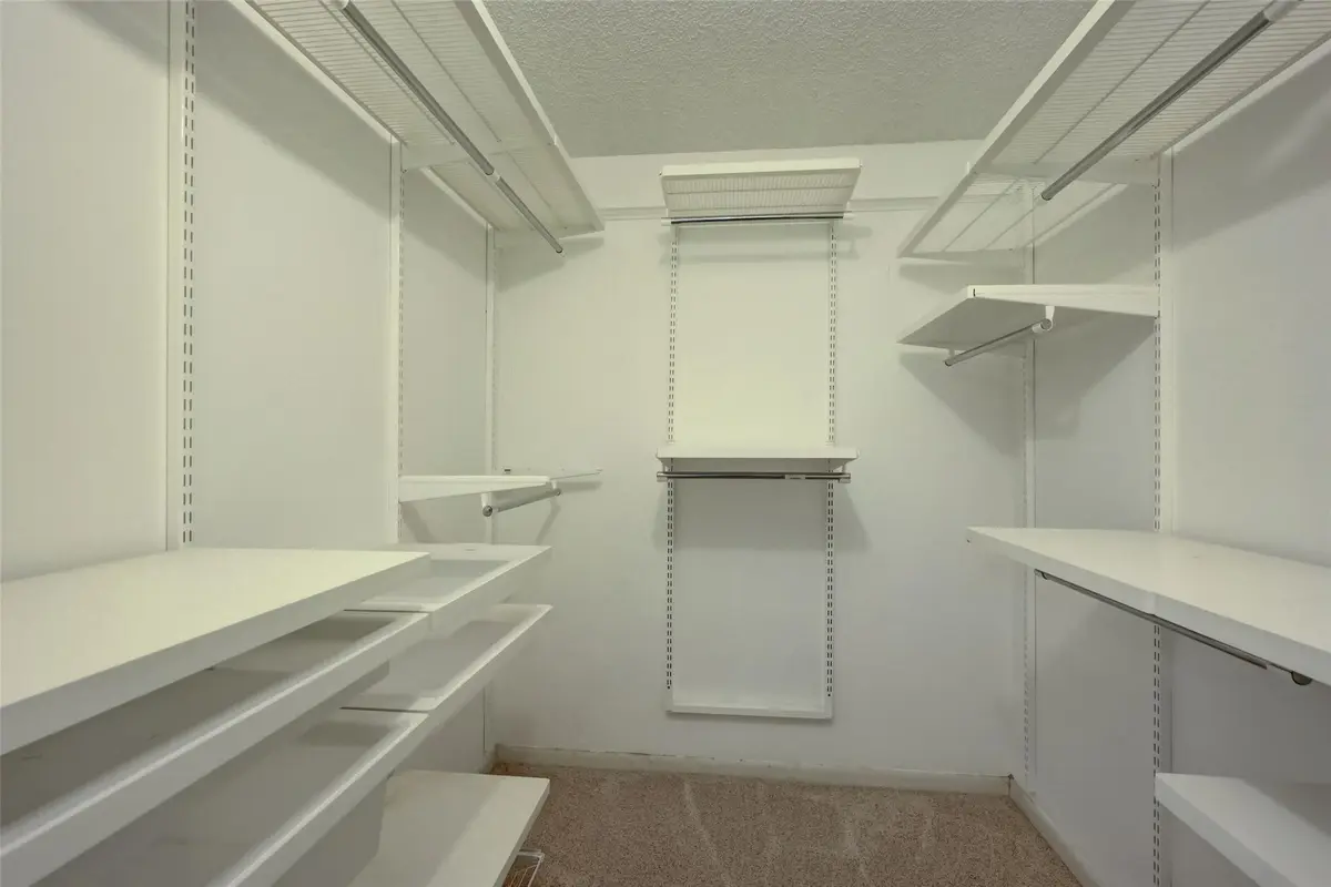 MAIN BEDROOM CLOSET at 4402 MARTINIQUE Court D2, Coconut Creek
