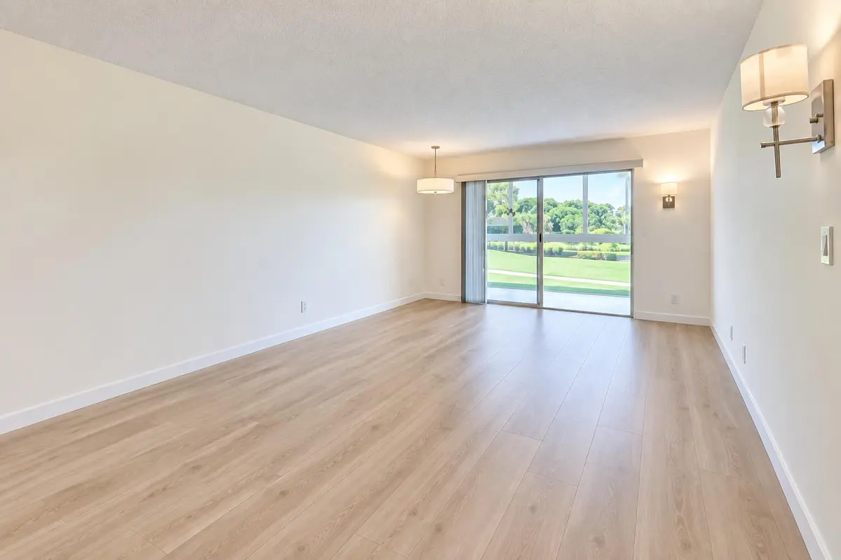 LIVING RM NEW WTRPROOF VINYL at 4402 MARTINIQUE Court D2, Coconut Creek