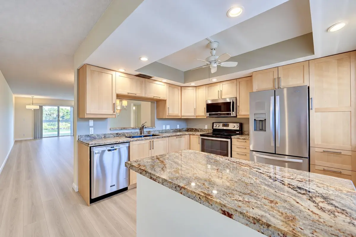 Bright Open-Plan Condo Kitchen and Livin at 4402 MARTINIQUE Court D2, Coconut Creek