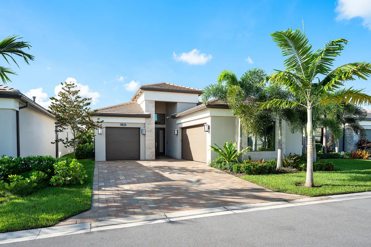 Lushly Landscaped Exterior at 9826 Turning Bluff Lane, Boynton Beach