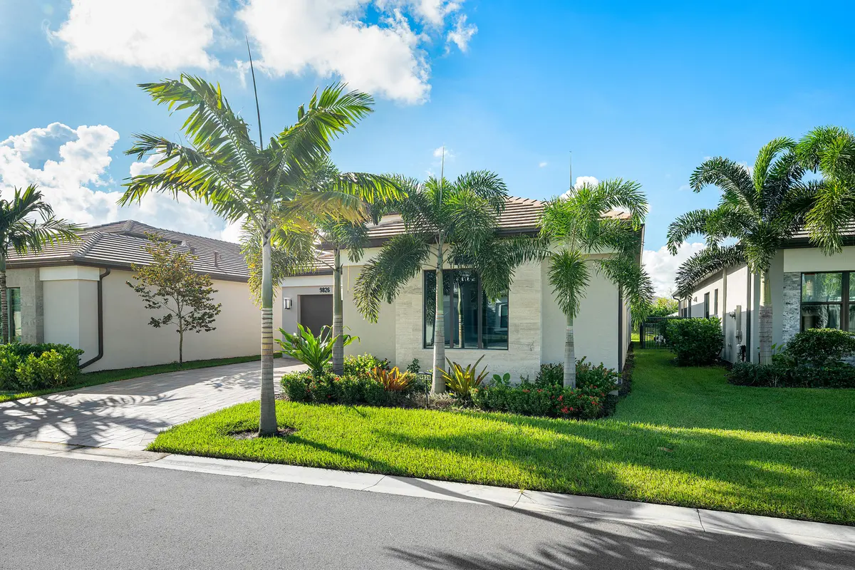 Lushly Landscaped Exterior at 9826 Turning Bluff Lane, Boynton Beach