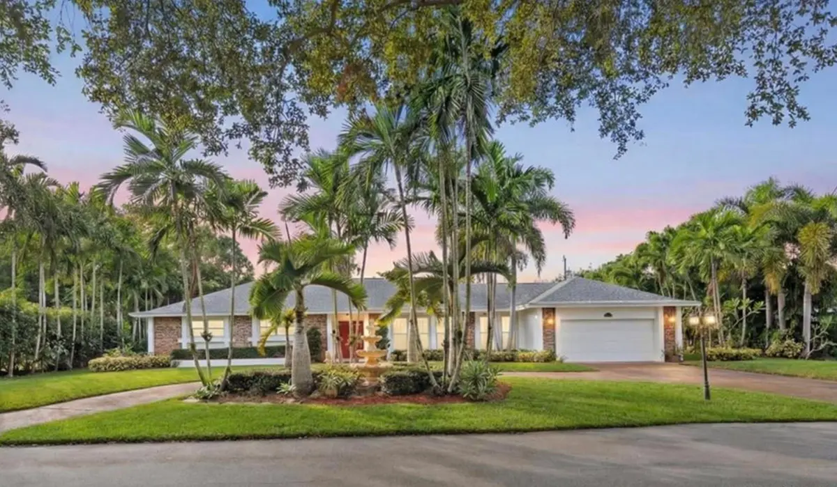 Nightime view of front at 8 Bell Lane, West Palm Beach