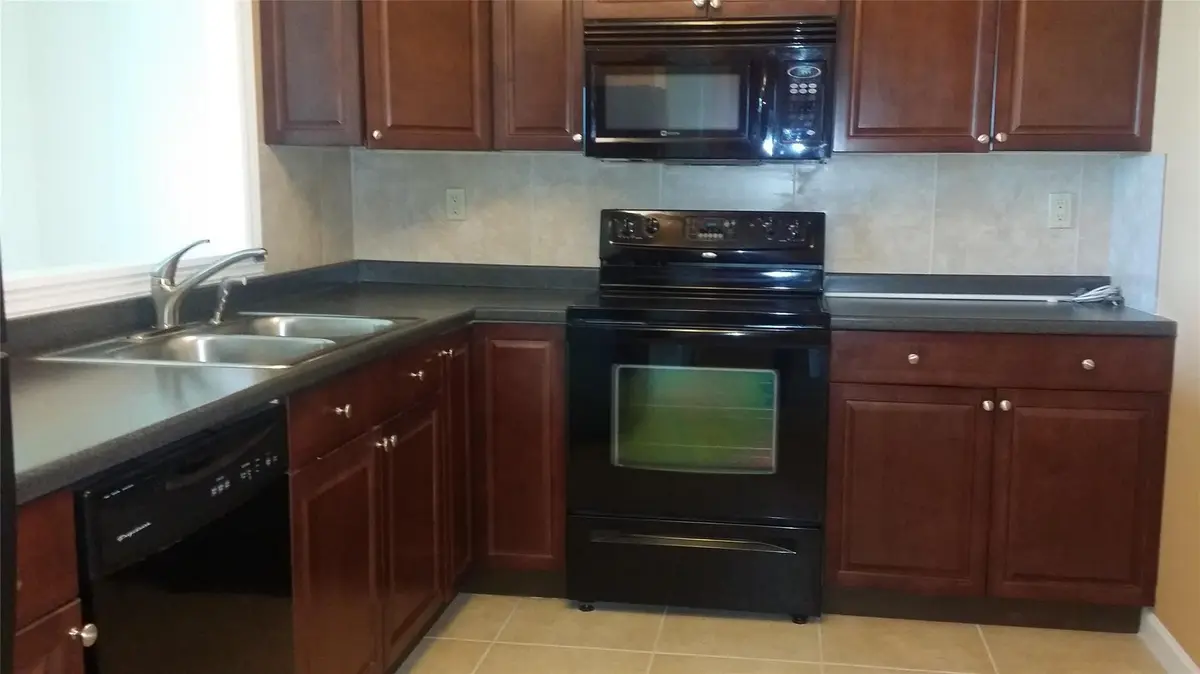 Photo 2 at 10777 W SAMPLE Road 910, Coral Springs