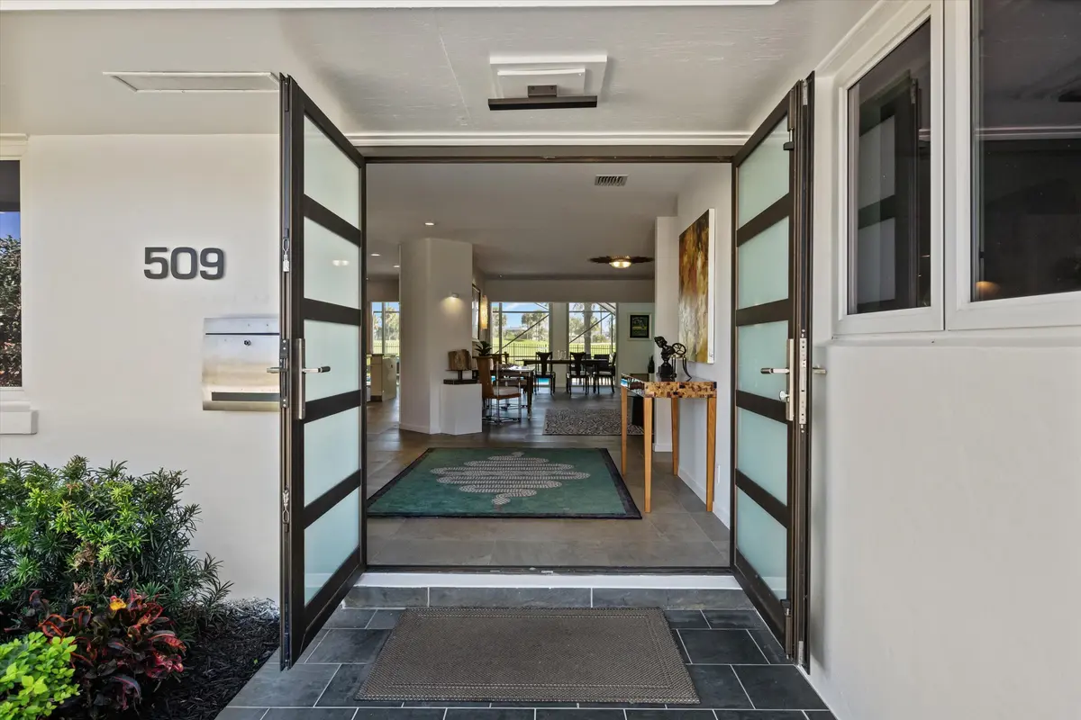 Double entry door at 509 Greenway Drive, North Palm Beach
