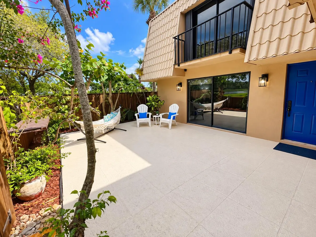 View of patio entrance to townhome at 5133 51st Way, West Palm Beach