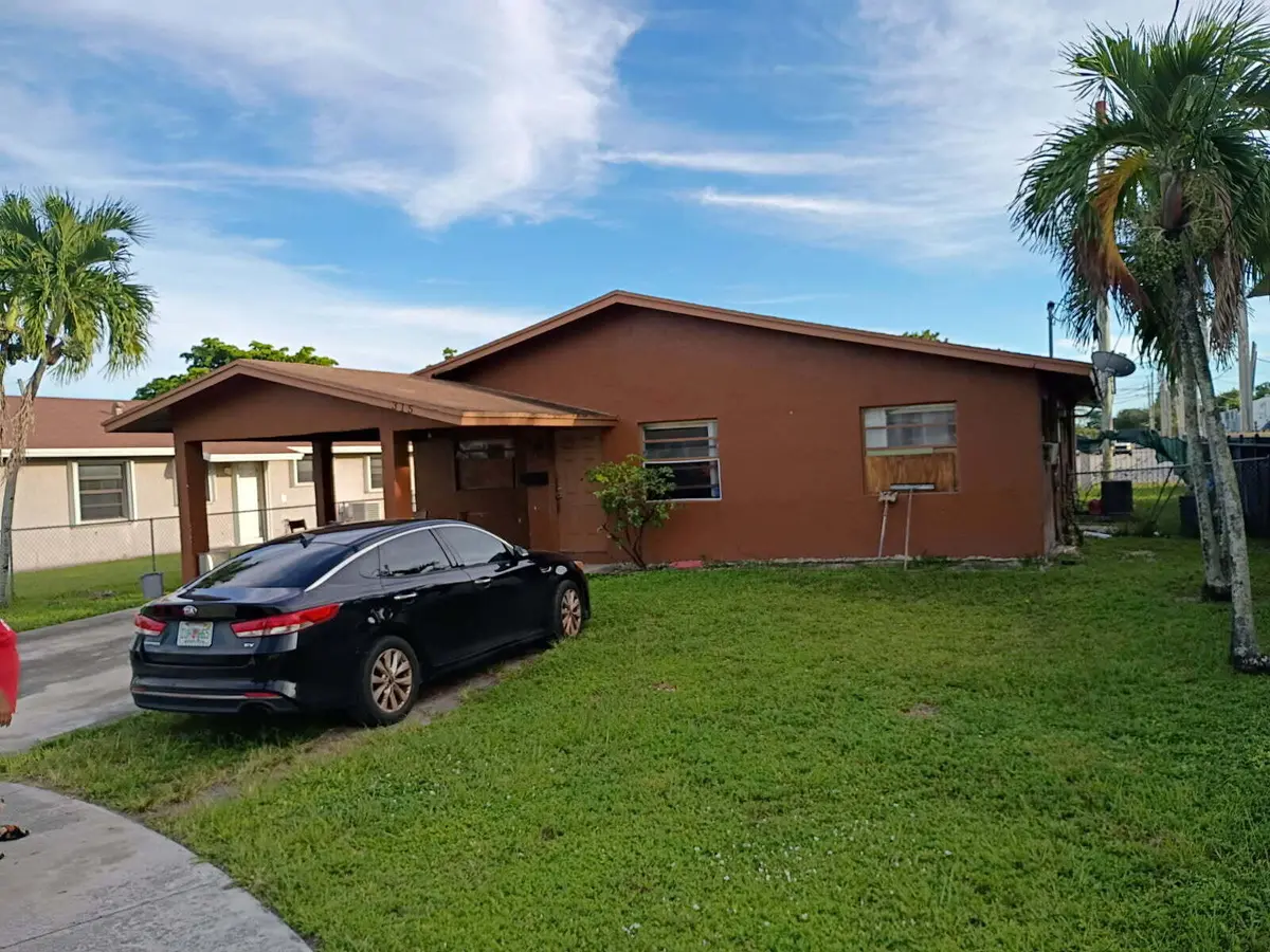 Front House with arport. at 315 NW 3RD Court, Hallandale Beach