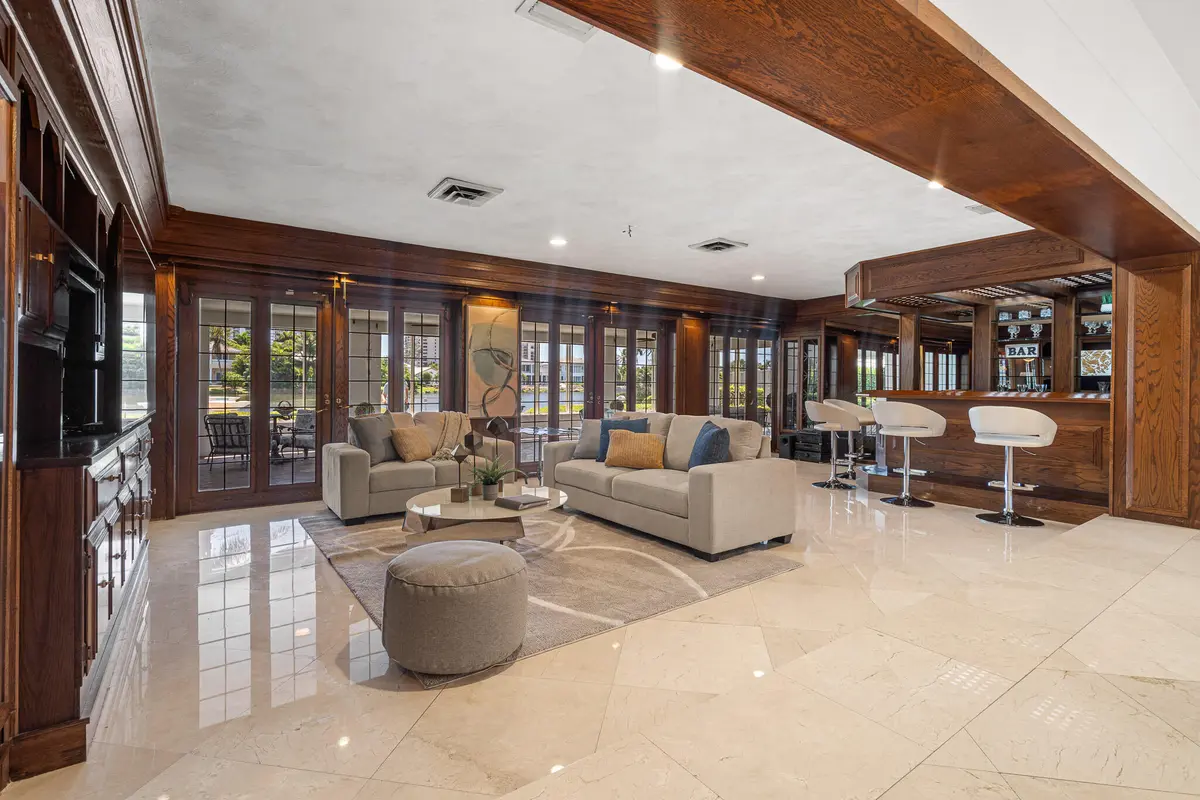 Family Room/Bar at 57 CAYUGA Road, Sea Ranch Lakes