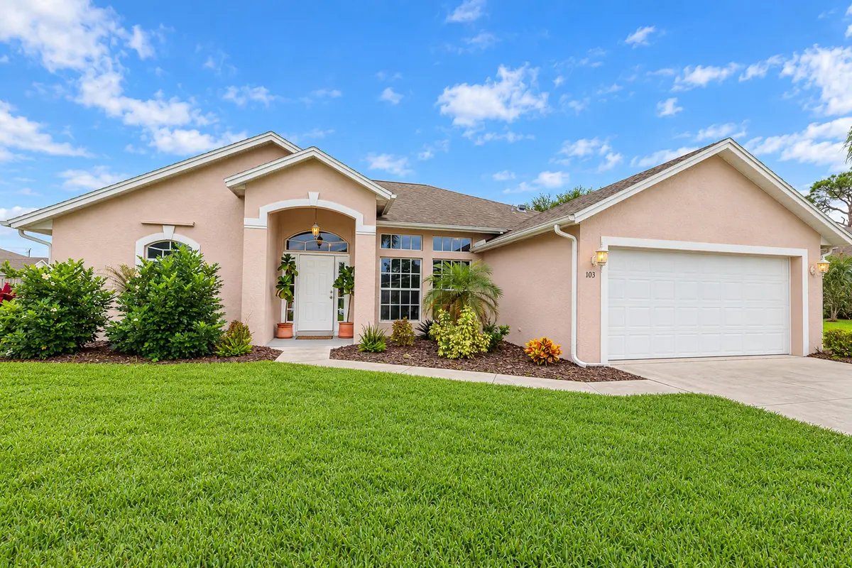 Front of house at 103 SW Pilsner Circle, Port St. Lucie