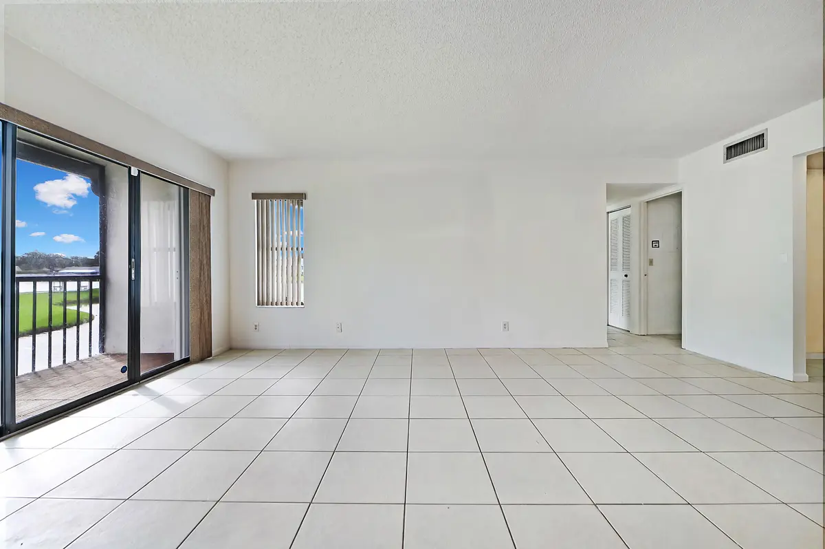 03 Living room 01 at 1005 Green Pine Boulevard C2, West Palm Beach