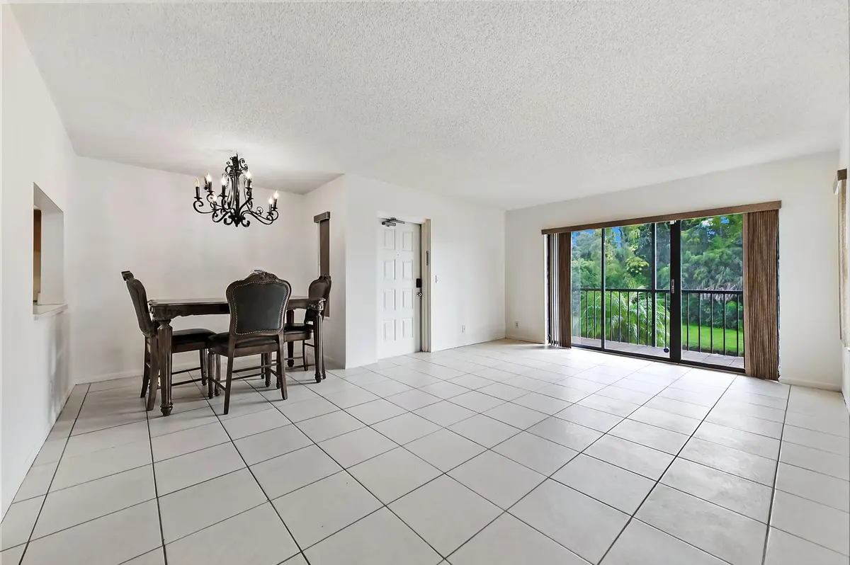 07 Dining room 01 at 1005 Green Pine Boulevard C2, West Palm Beach