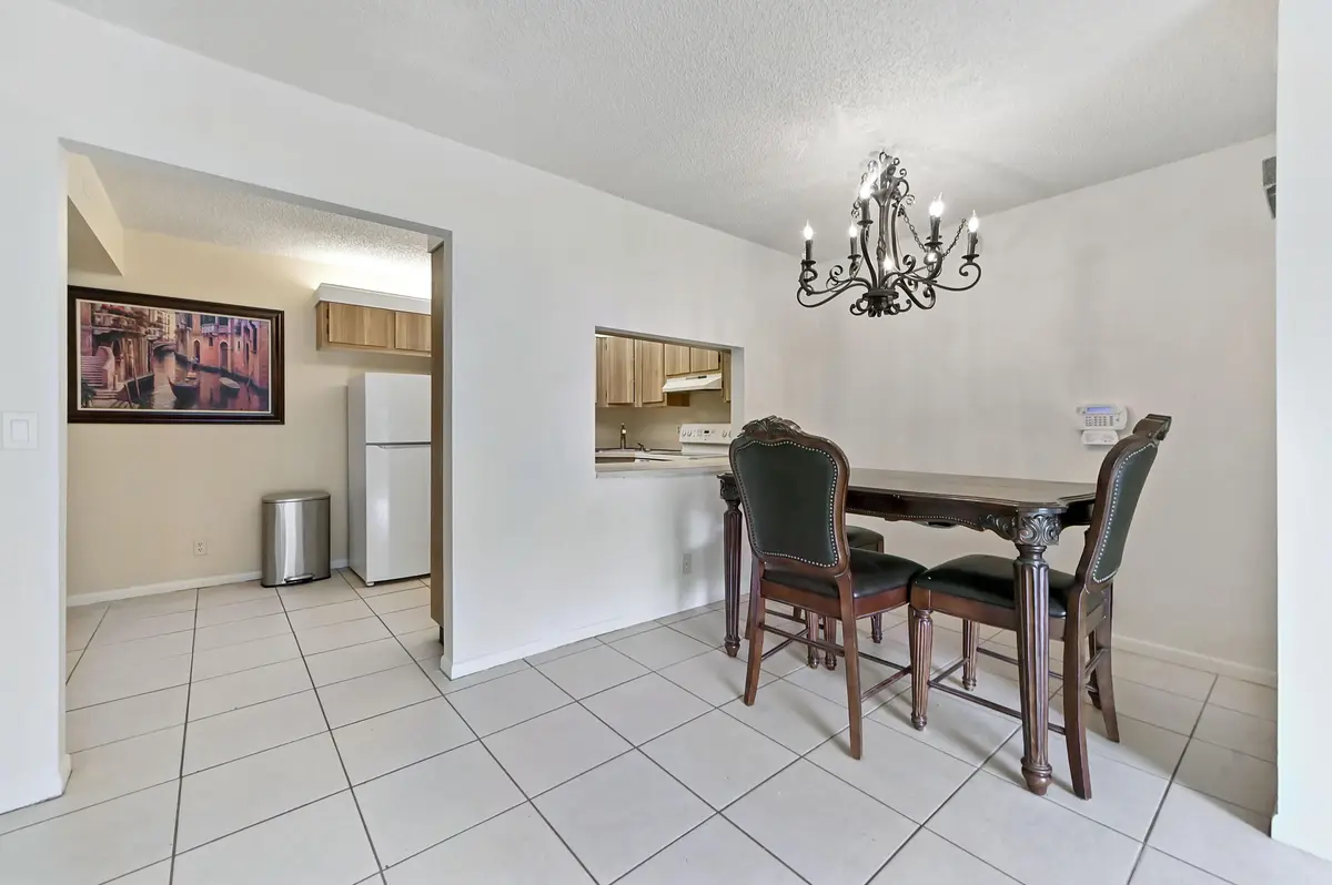 08 Dining area 01 at 1005 Green Pine Boulevard C2, West Palm Beach