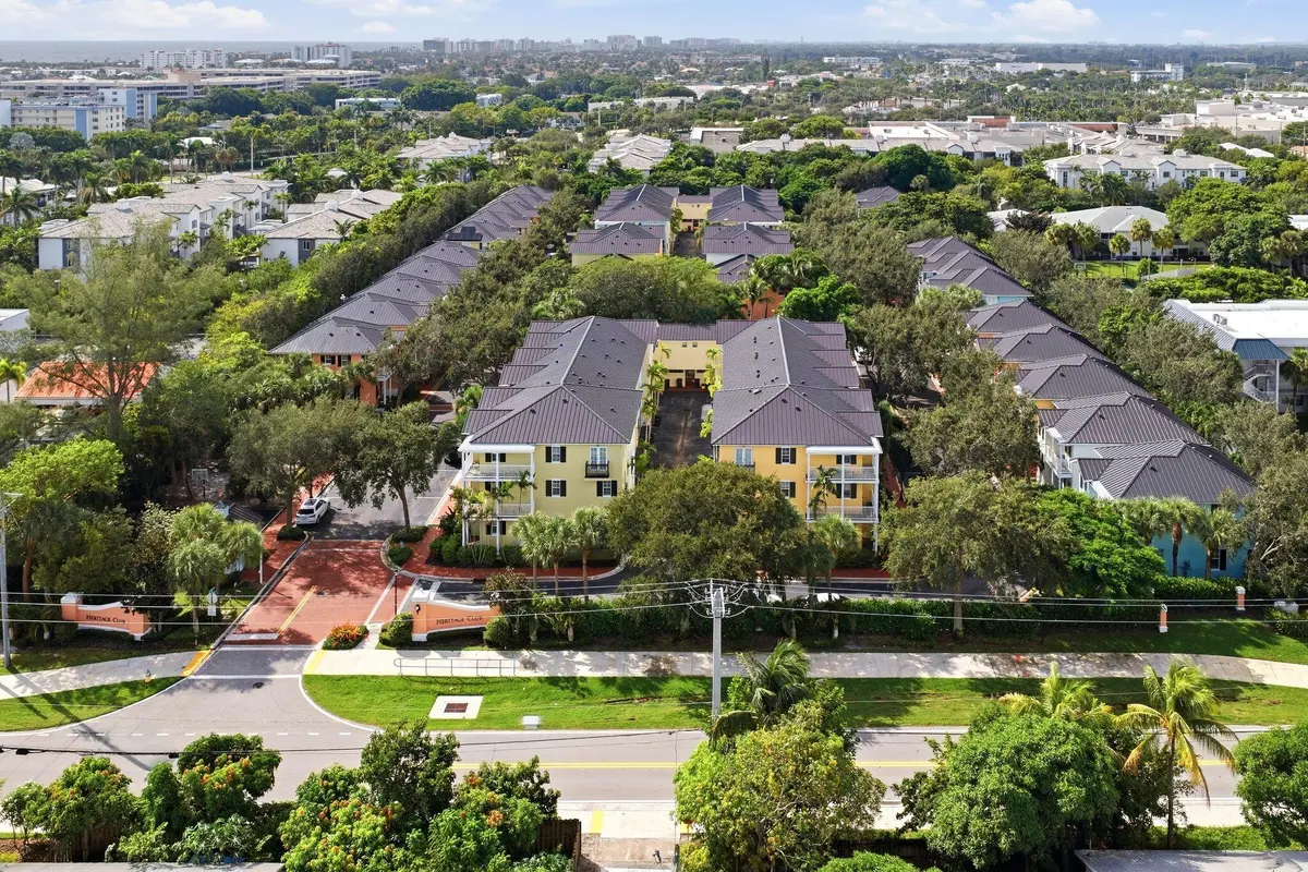 Entrance and aerial view South at 1009 W Heritage Club Circle, Delray Beach