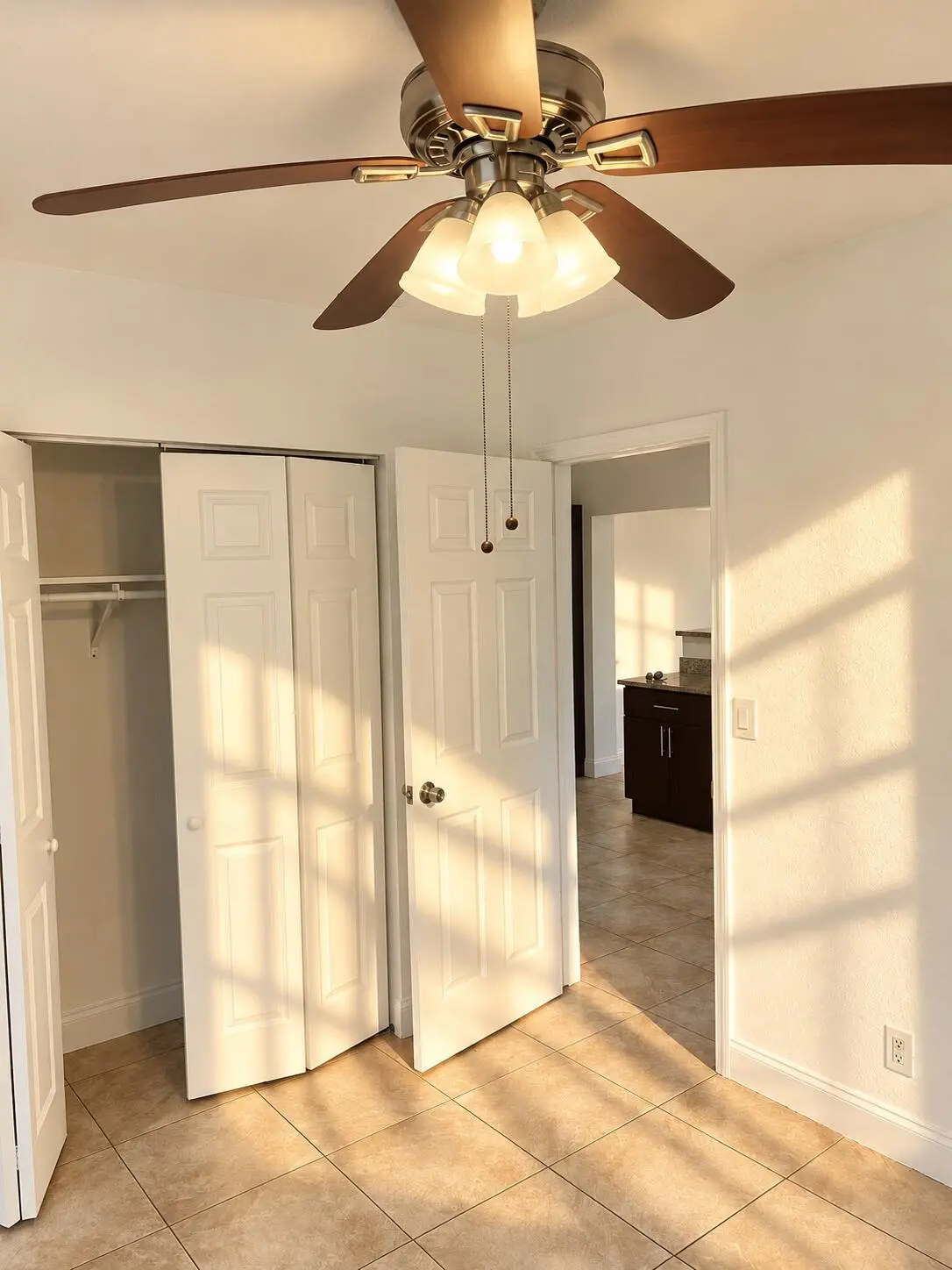Sunlit Room with Ceiling Fan at 5260 NE 16TH Avenue, Pompano Beach