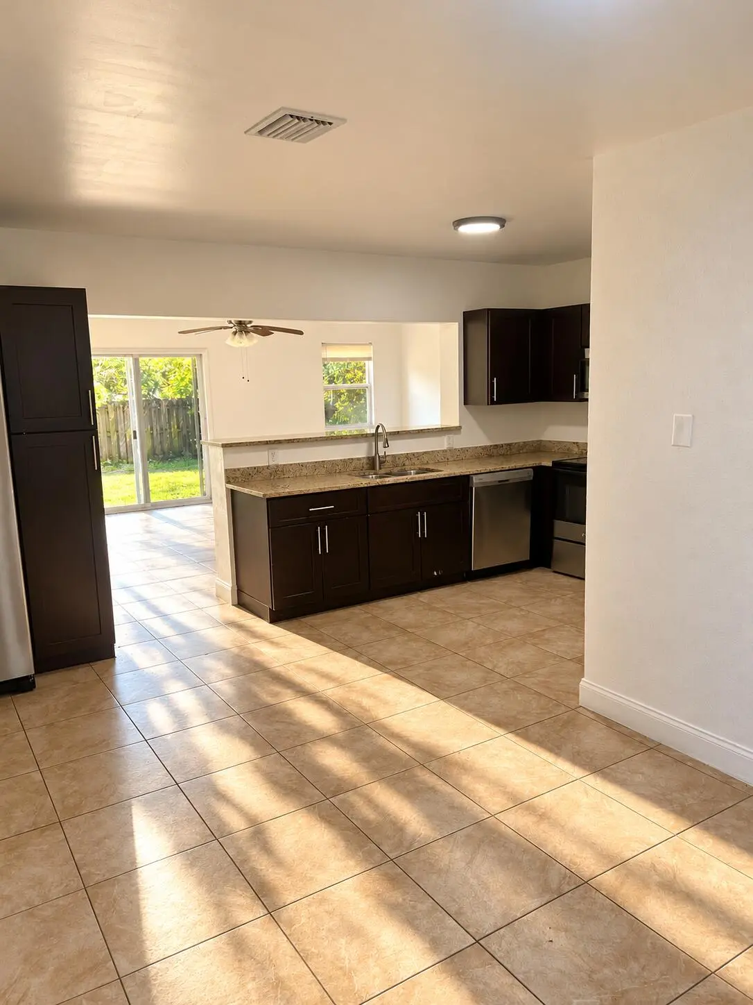 Sunlit Modern Kitchen and Living Space ( at 5260 NE 16TH Avenue, Pompano Beach