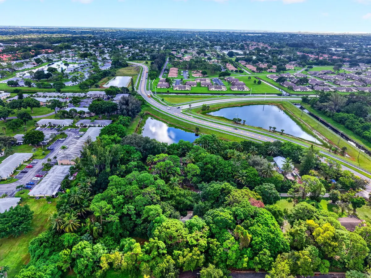 11-web-or-mls-DJI_20261005100038_0947_D at 5679 SIMS Road, Delray Beach