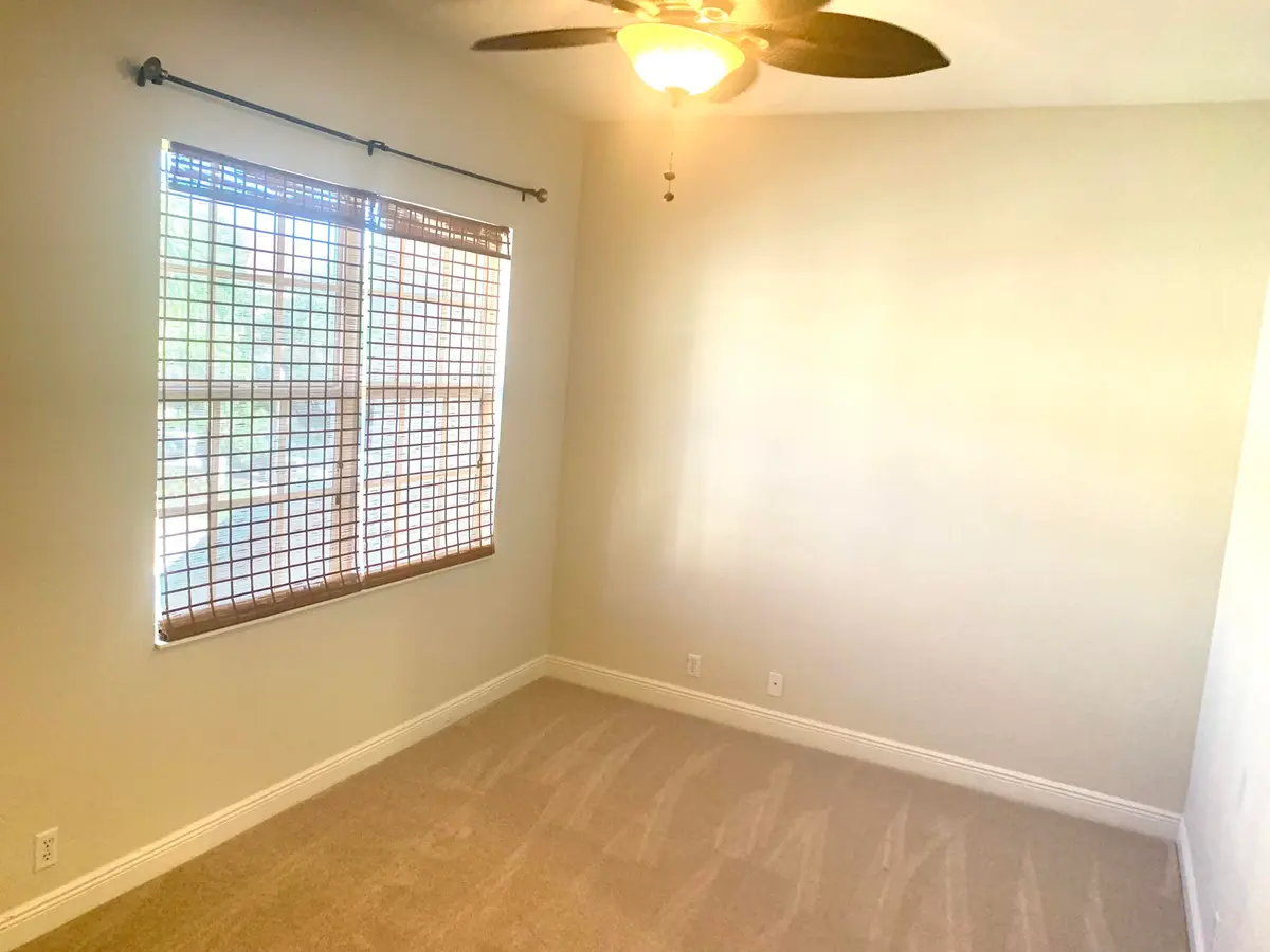 Main floor bedroom at 4805 SAWGRASS BREEZE Drive, Palm Beach Gardens