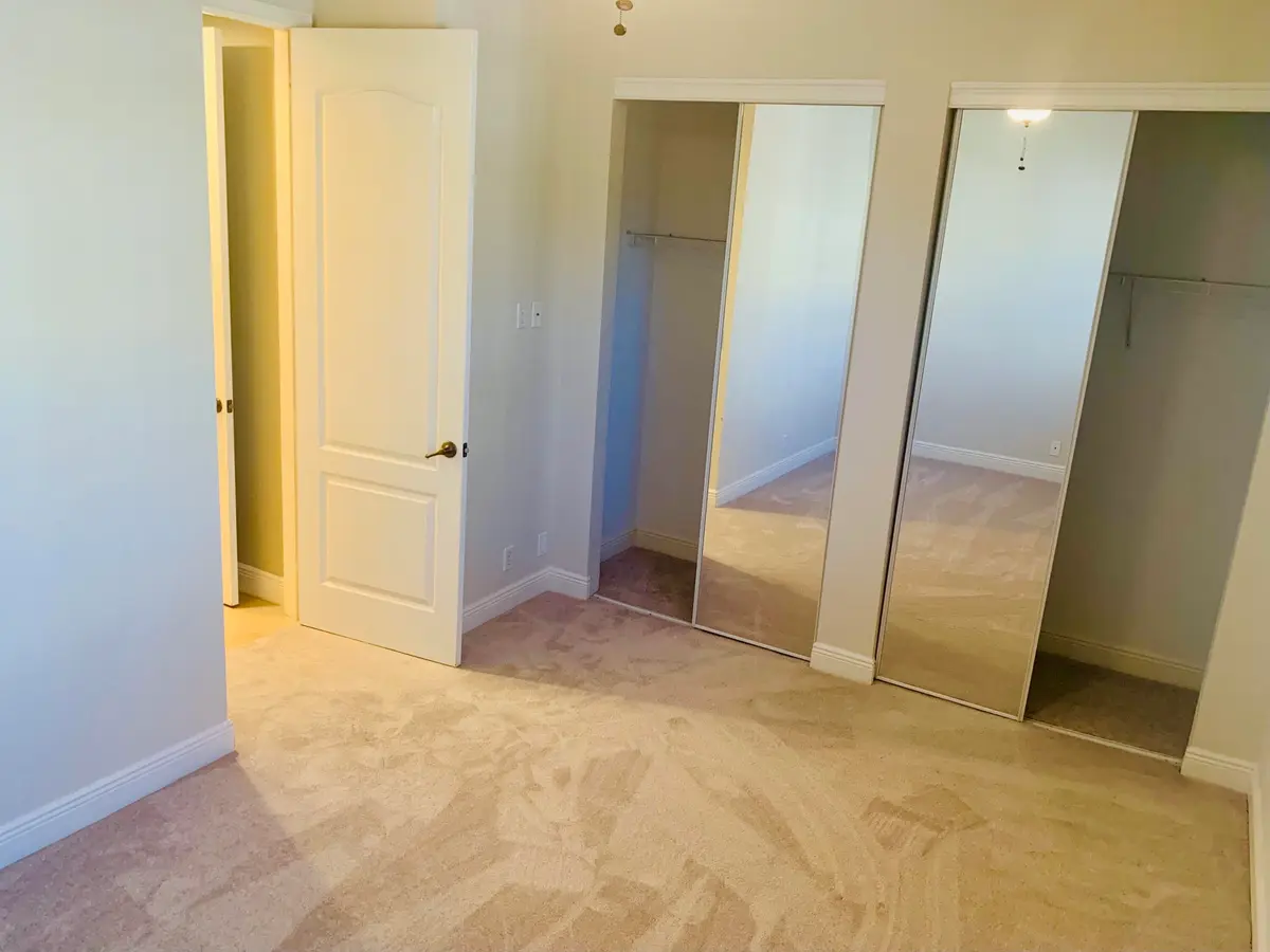 Main floor bedroom at 4805 SAWGRASS BREEZE Drive, Palm Beach Gardens