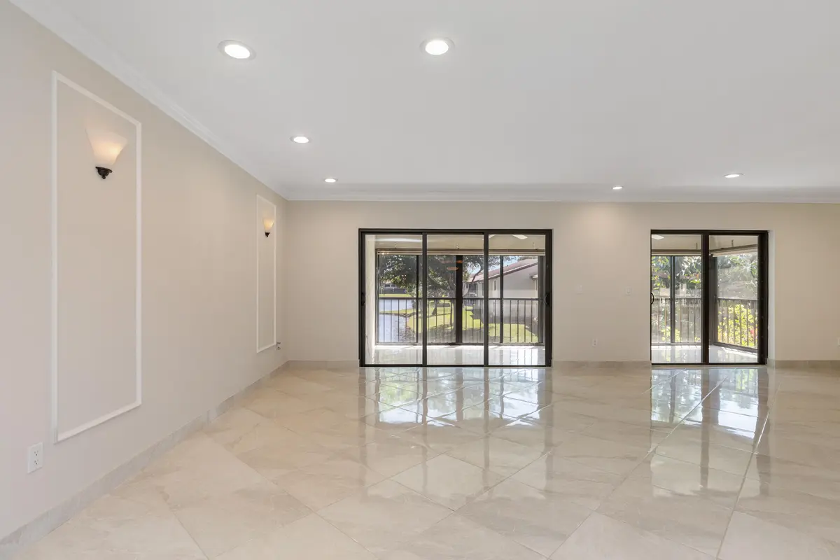 LIVING ROOM IMPACT DOORS at 21851 ARRIBA REAL L, Boca Raton