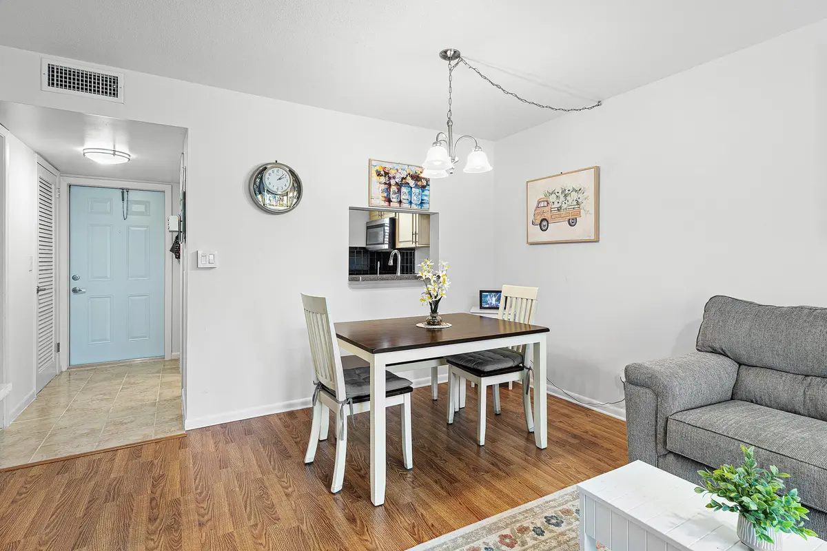 Dining/Kitchen/Foyer at 5510 TAMBERLANE Circle 247, Palm Beach Gardens