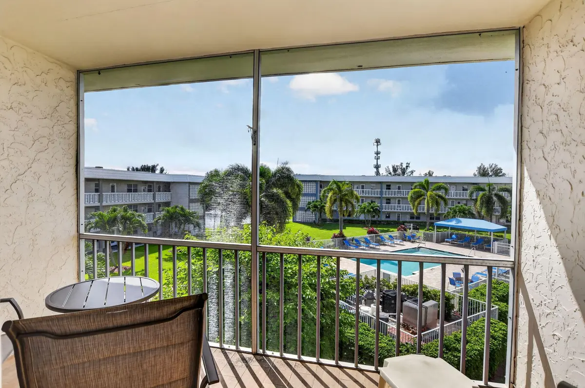 Patio overlooking pool at 9872 MARINA Boulevard 1438, Boca Raton