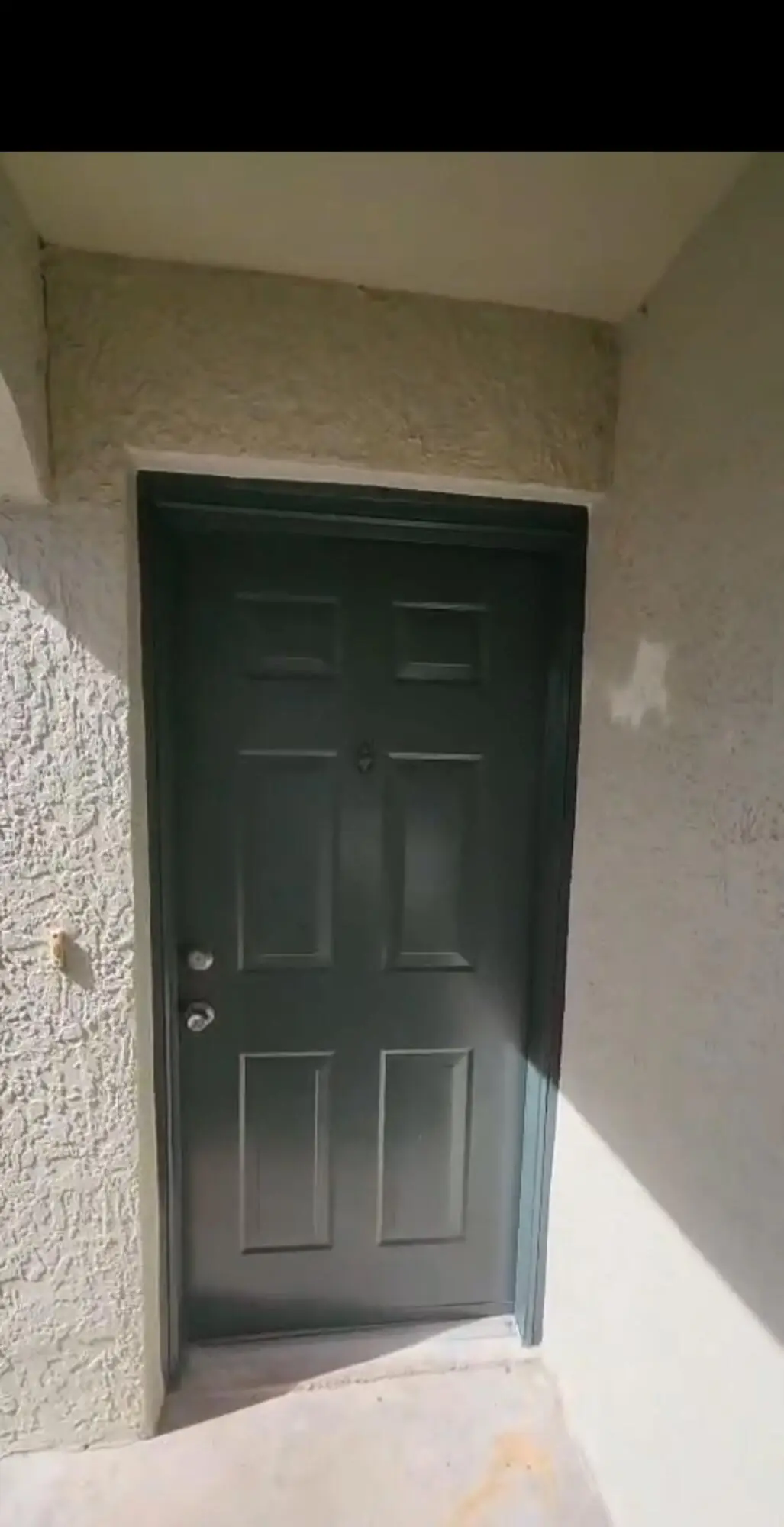 Front door at 128 SW PEACOCK Boulevard 15-206, Port St. Lucie