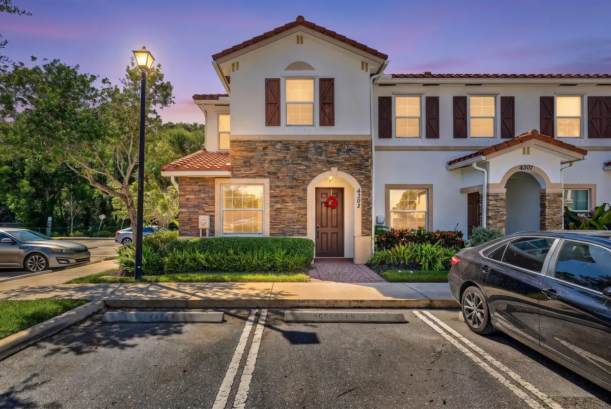 Maybelle-front1-DAY-TO-DUSK-AI at 4305 Maybelle Lane, West Palm Beach