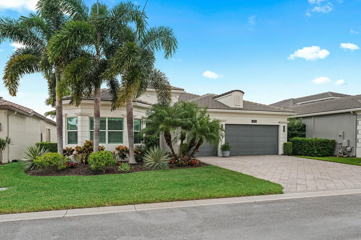 Lushly Landscaped Exterior at 8223 Majestic Mountain Drive, Boynton Beach