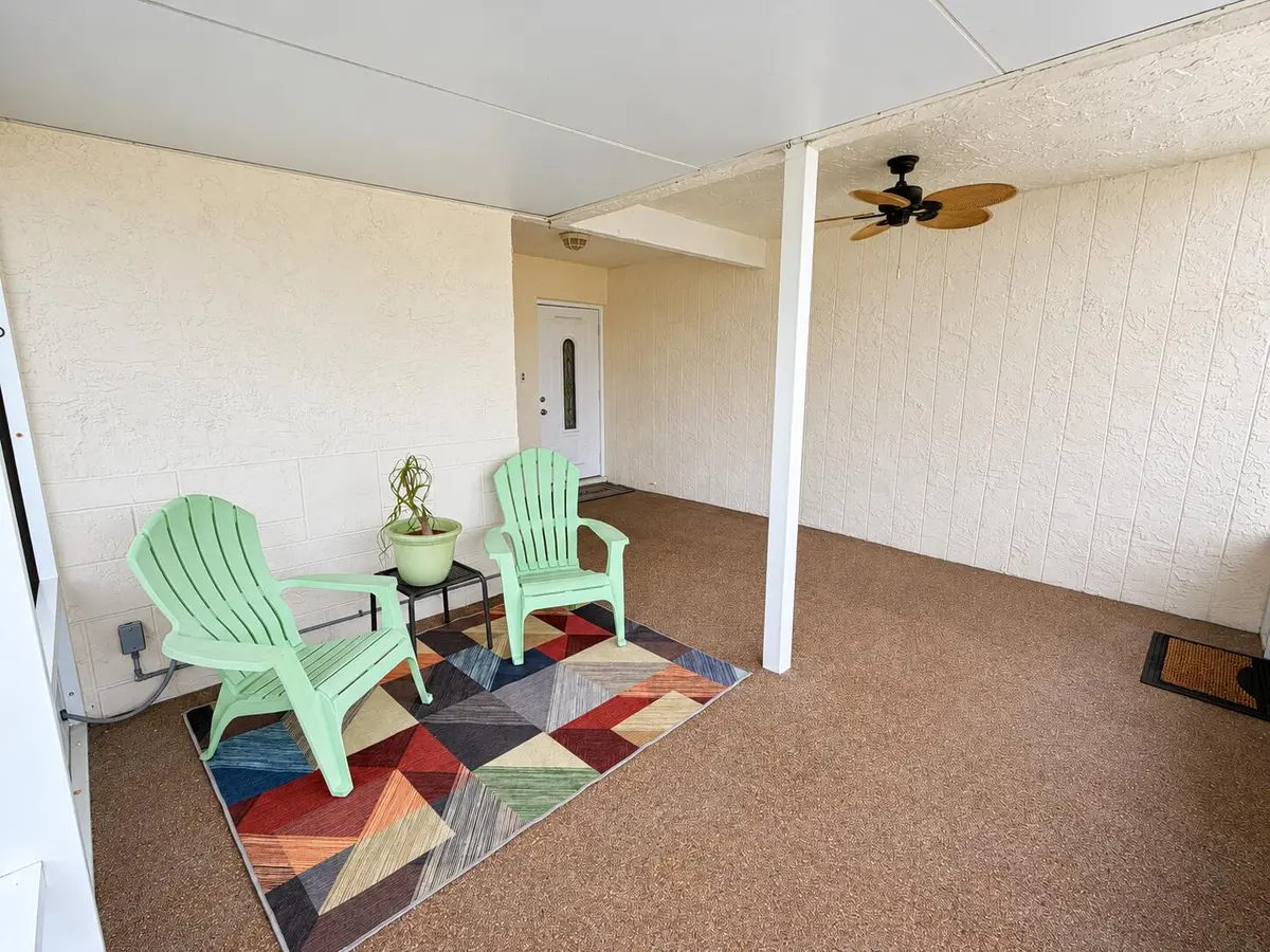 Natural daylight refreshes a shaded fron at 6309 DUSENBURG Road, Delray Beach