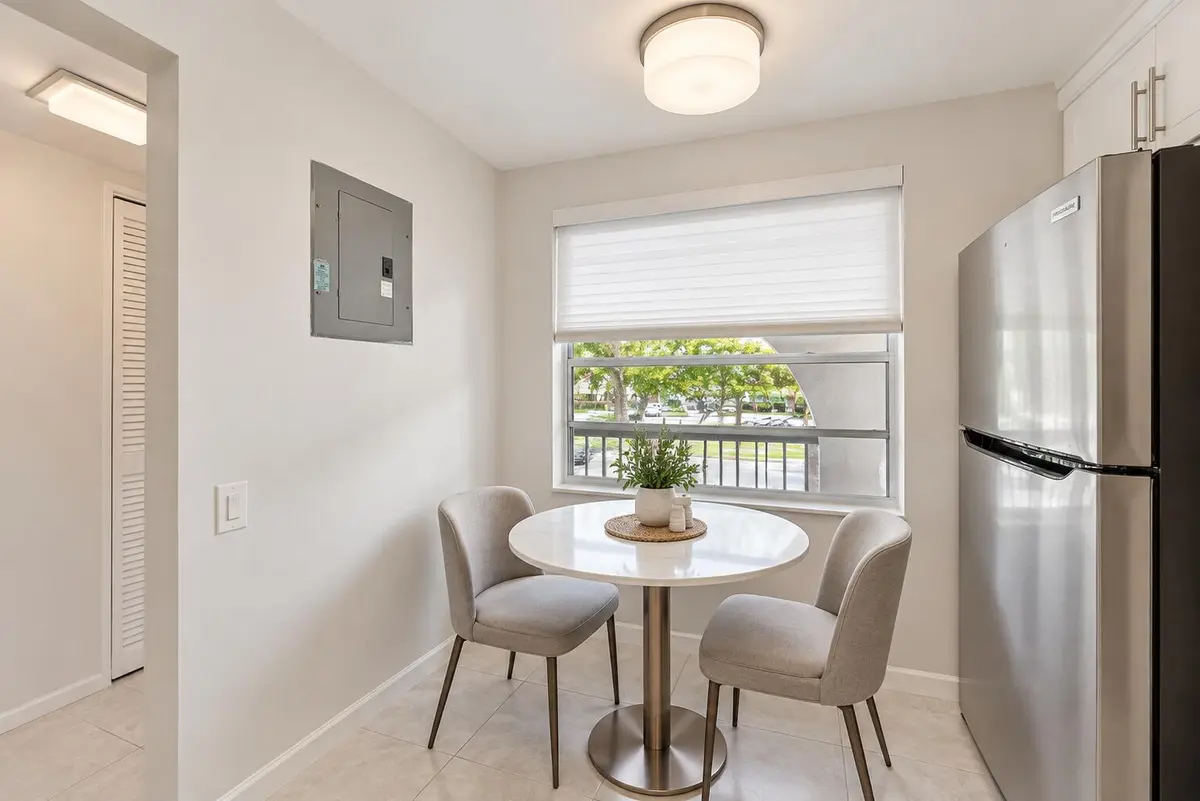 Bright Modern Kitchen Breakfast Nook at 1204 BAHAMA Bend B2, Coconut Creek