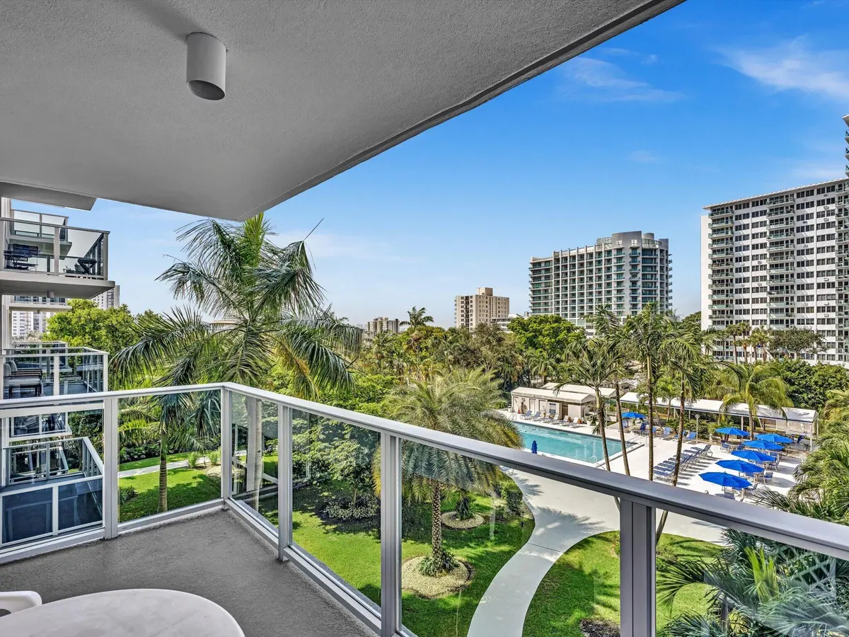Glass balcony pool view at 3333 NE 34TH Street 418, Fort Lauderdale