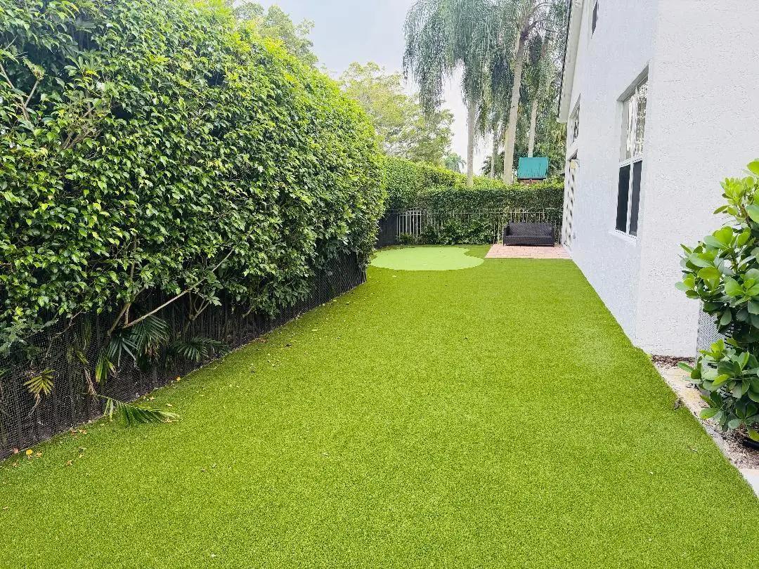 Rear Turfed Area / Putting Green at 3387 NW 53rd Circle, Boca Raton