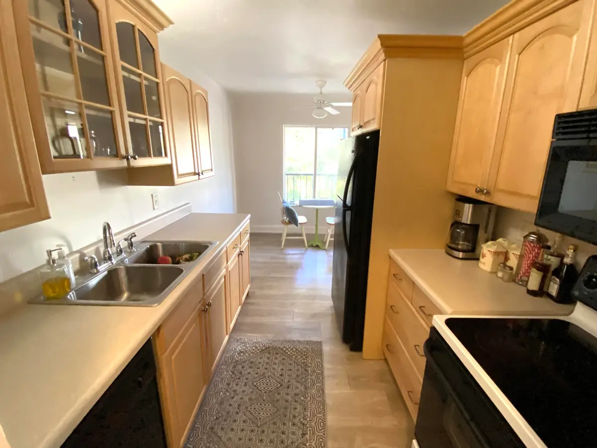 Kitchen at 150 Pineview Road H8, Jupiter