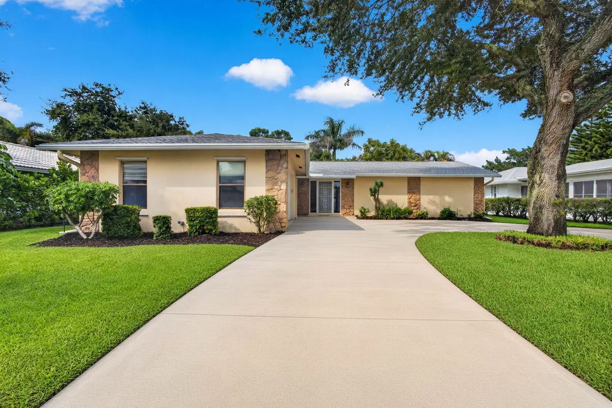 Exterior Front at 9881 SE LITTLE CLUB Way, Jupiter