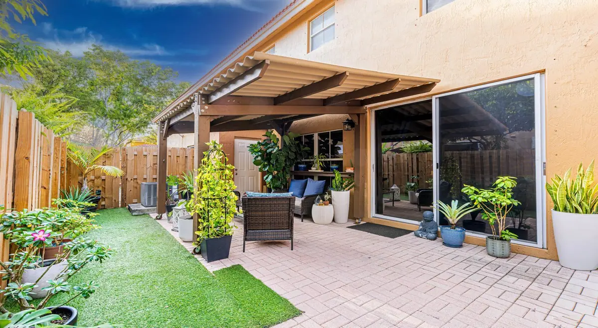 backyard patio area at 8422 NW 140th Terrace 3603, Miami Lakes
