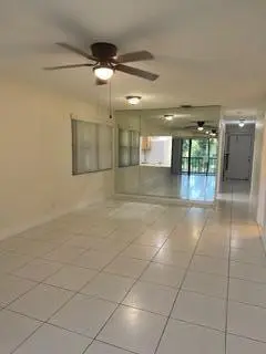 Living into dining area at 5939 FOREST HILL Boulevard 206, West Palm Beach