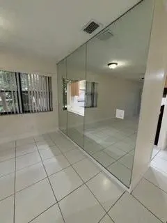 Dining area with pass through to kitchen at 5939 FOREST HILL Boulevard 206, West Palm Beach