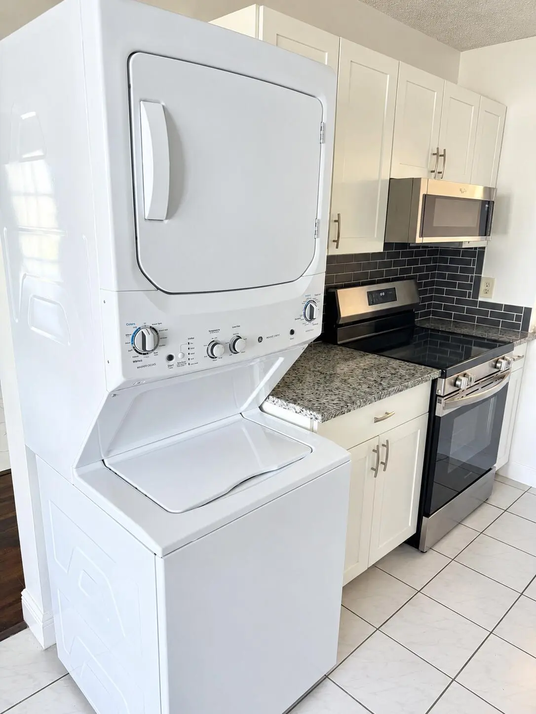 Bright Modern Kitchen Laundry Corner at 1120 LEMON TREE Terrace 73-C, Delray Beach